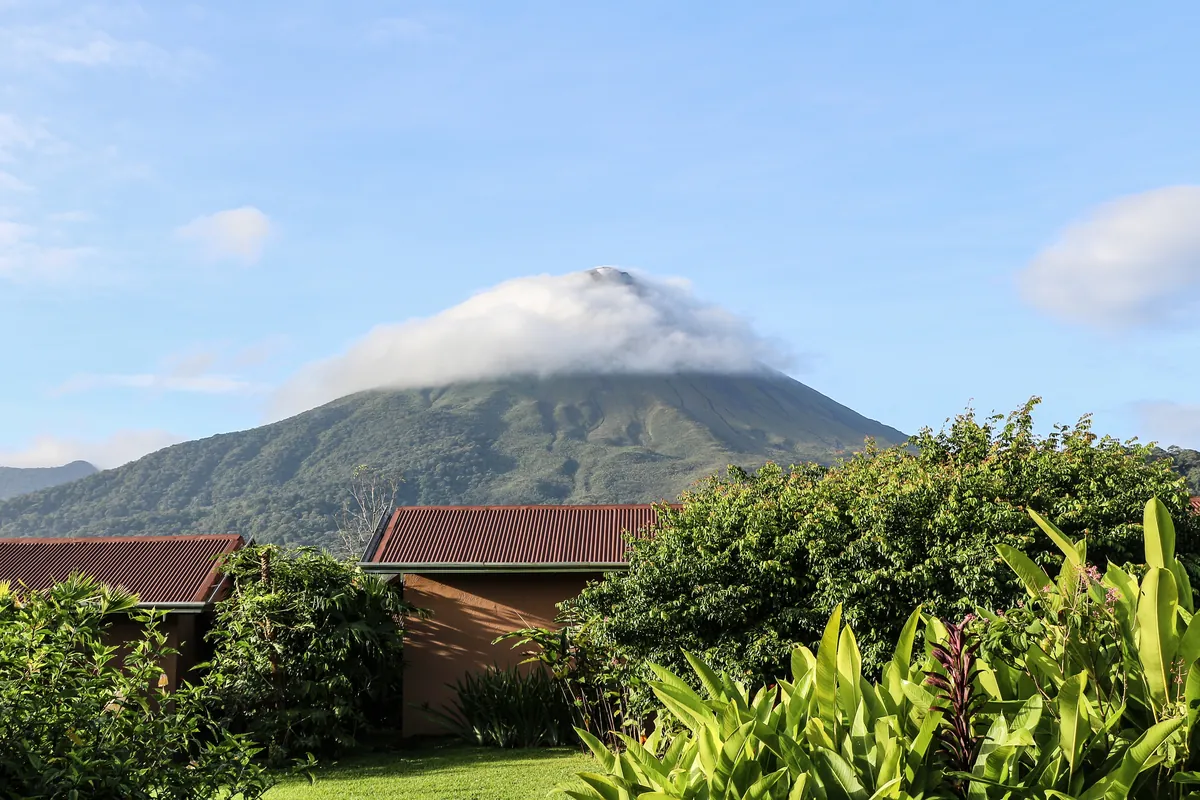 Arenal Volcano's cone reflected in Lake Arenal, Costa Rica